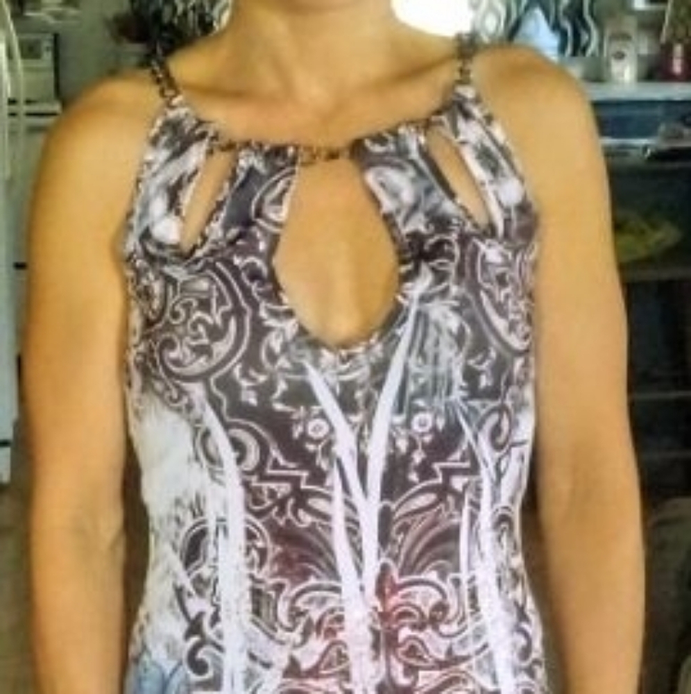 Small Strapless Dress With Pretty Sparkly Design On Front Curve Fitting